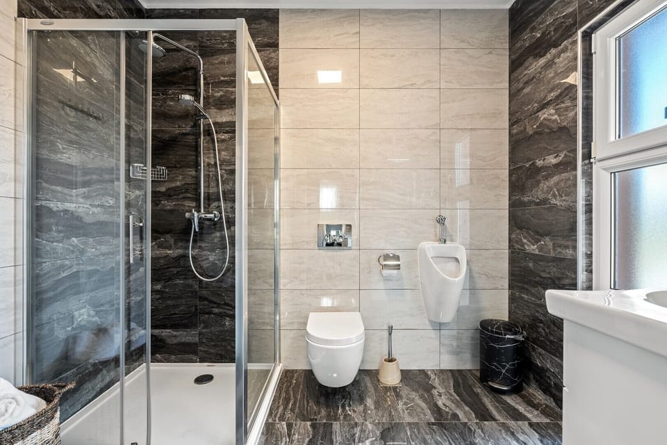 Family Bathroom No1 with a shower
