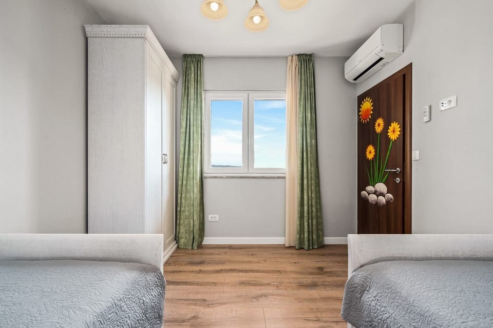 Bedroom No 3 with two single beds 90cm x200cm, A/C
