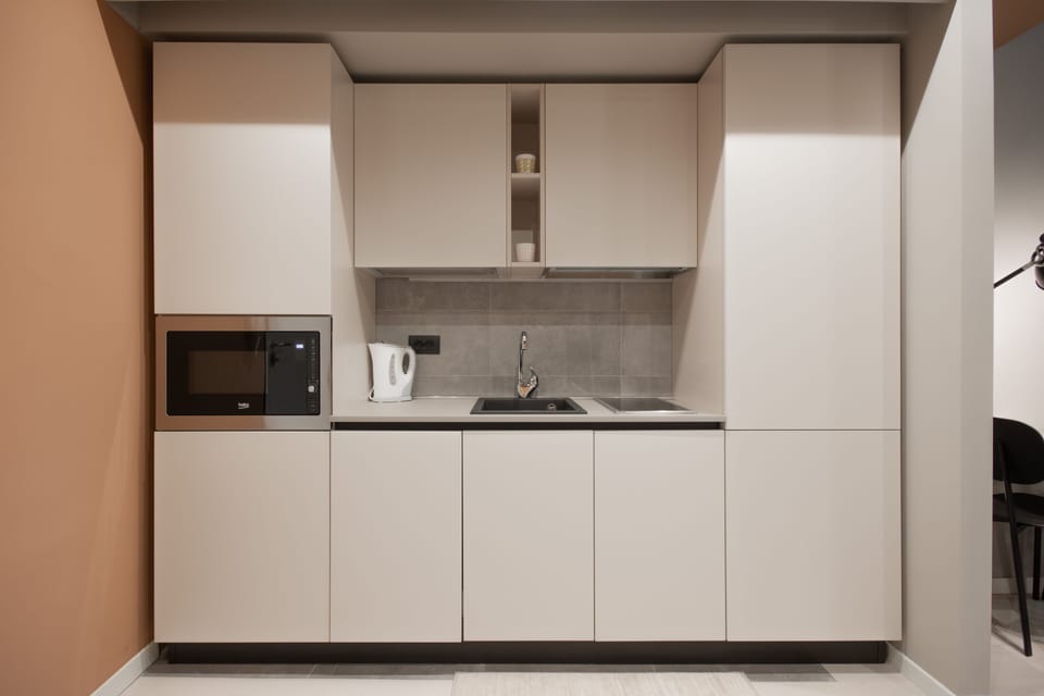 Apartment, 1 Bedroom | Private kitchen | Full-size fridge, microwave, stovetop, dishwasher