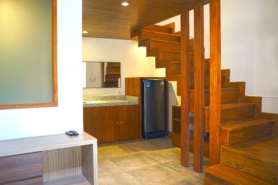 Mezanine Suites Room | Living area | LED TV
