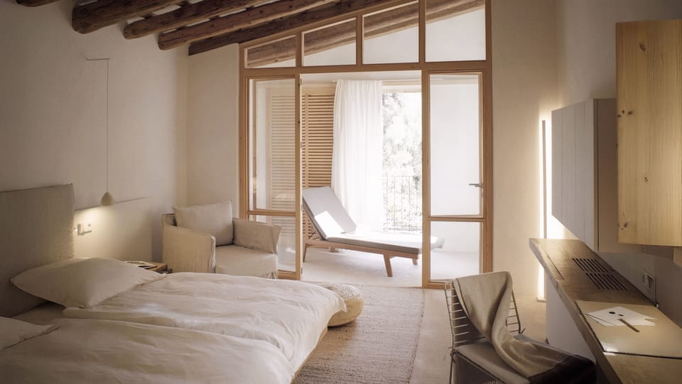 Premium bedding, down comforters, memory foam beds, minibar