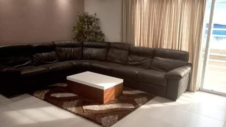 Luxury Villa, 4 Bedrooms | Living area | Flat-screen TV