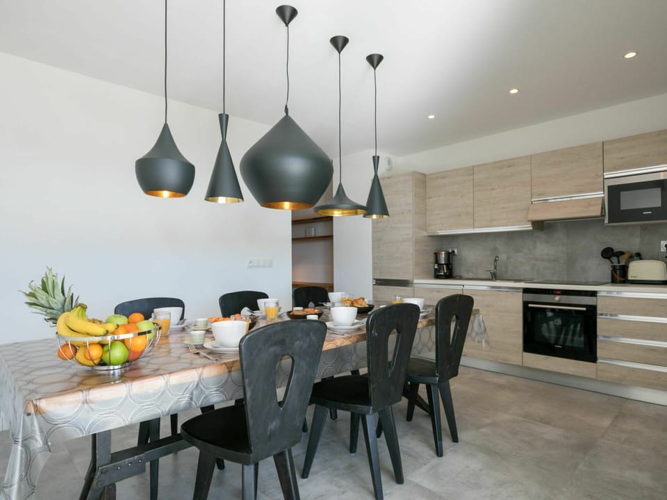 Table, Furniture, Tableware, Countertop, Lighting, Interior Design, Chair, Kitchen Appliance, Floor, Flooring