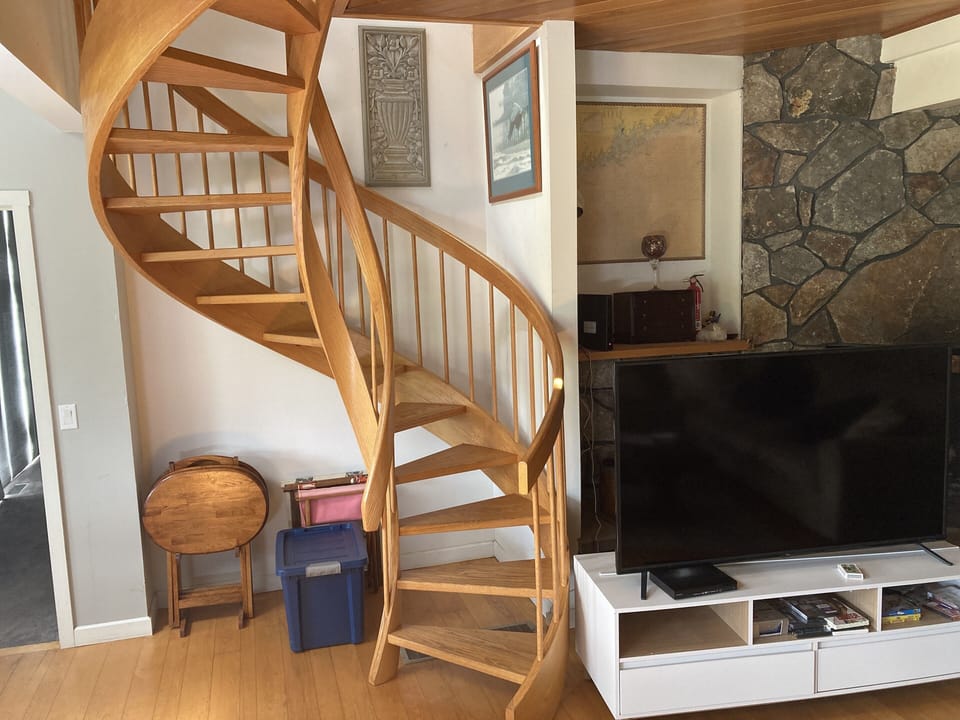 Spiral staircase to 2nd bedroom and loft