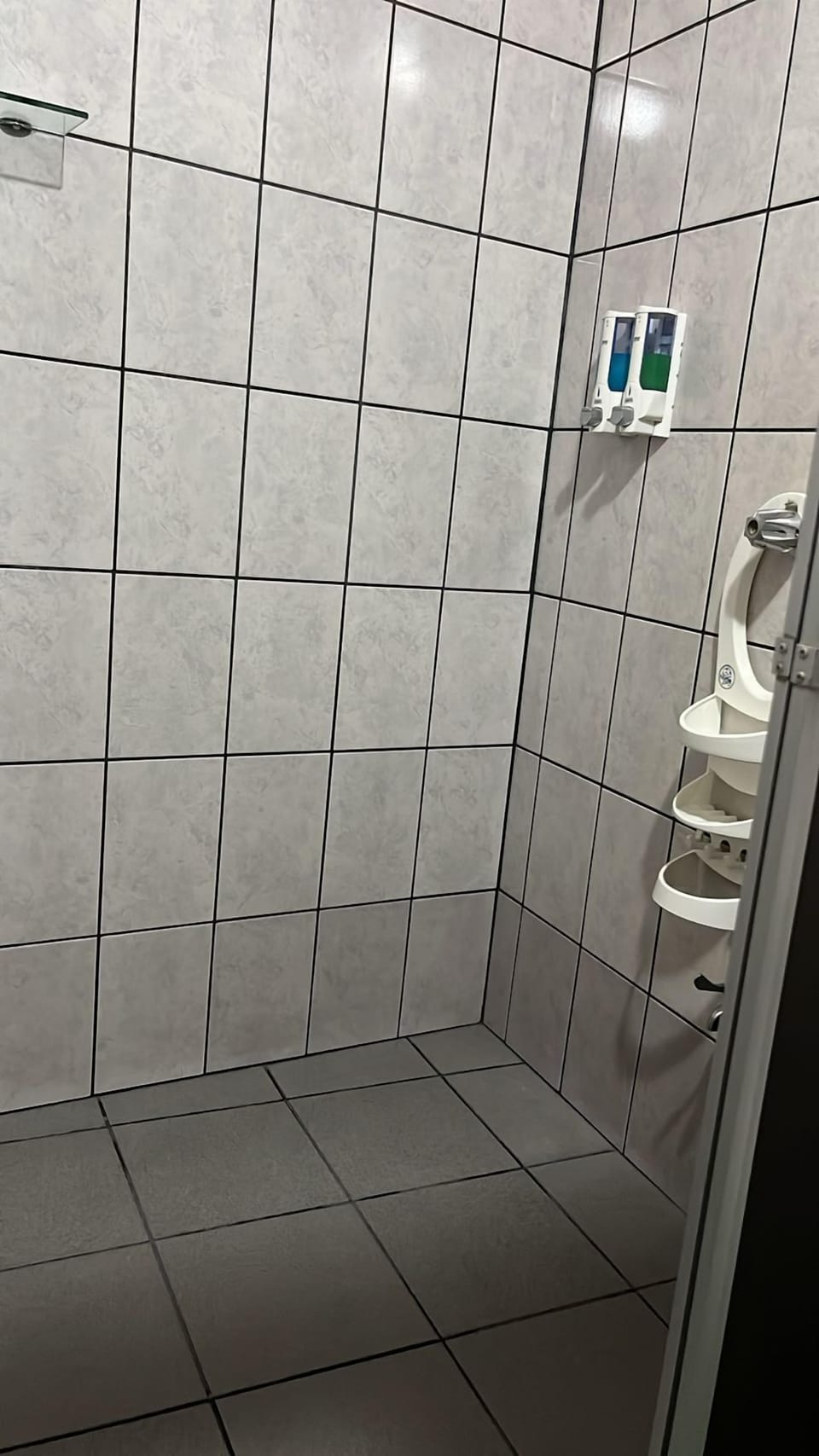 Shower, rainfall showerhead, hair dryer, towels