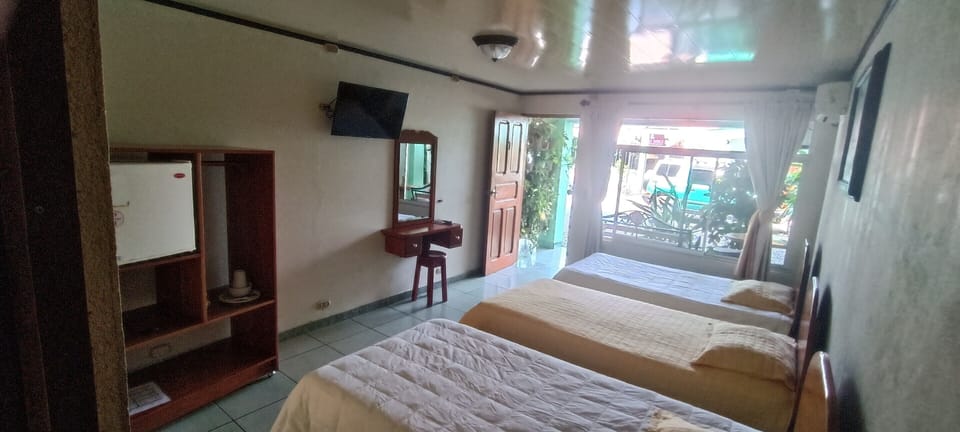Standard Triple Room | Minibar, individually decorated, individually furnished, desk