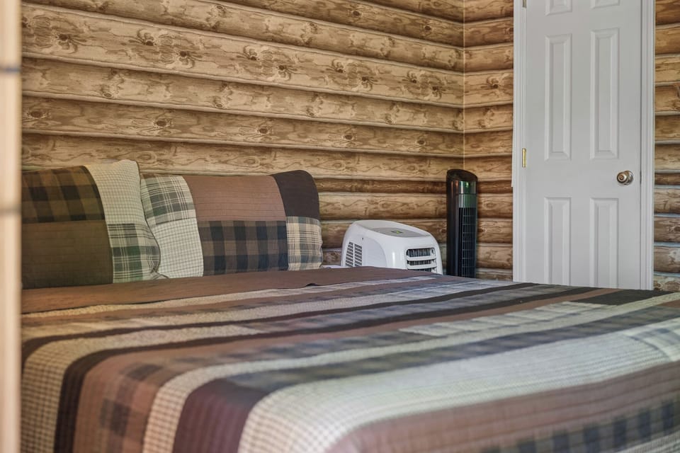 Rustic comfort with wood beams and a cozy king-size bed