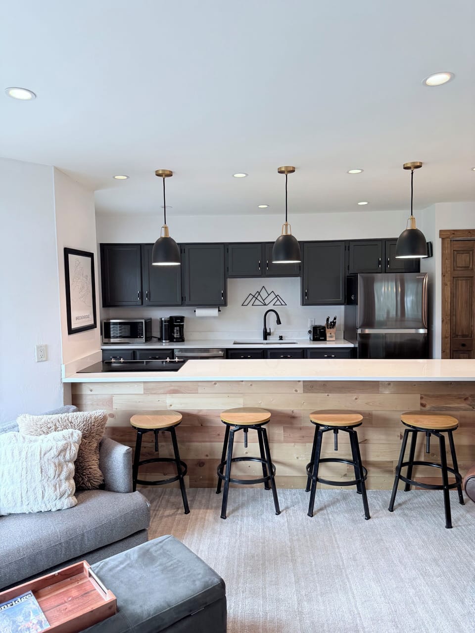 Newly refinished kitchen with quartz  counters seating for 4