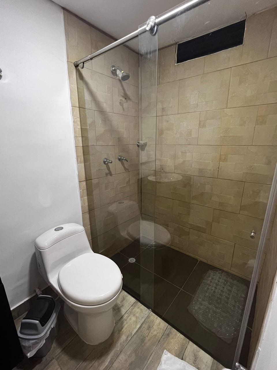 Shower, towels, soap, shampoo
