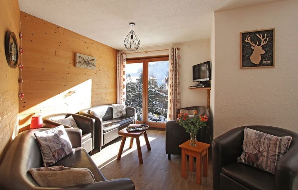Sink into the cozy sofa after a day exploring the area.