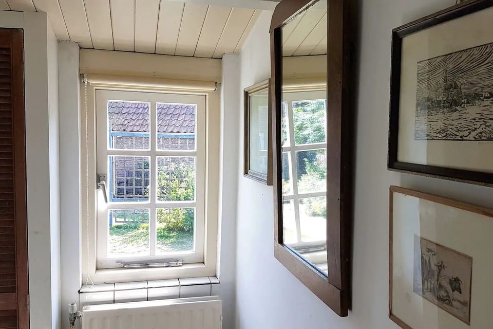 passage overlooking the garden and towards downstairs WC