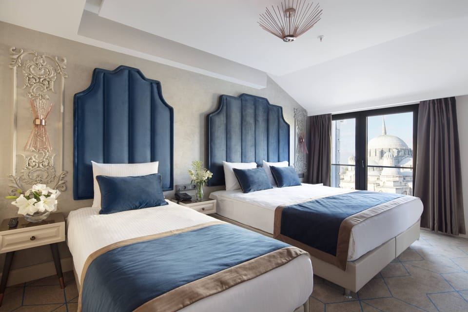 Deluxe Triple Room | Premium bedding, minibar, in-room safe, desk