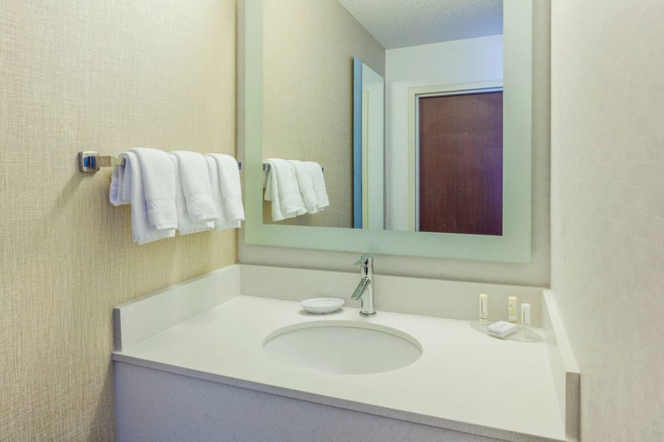Combined shower/tub, hair dryer, towels, soap
