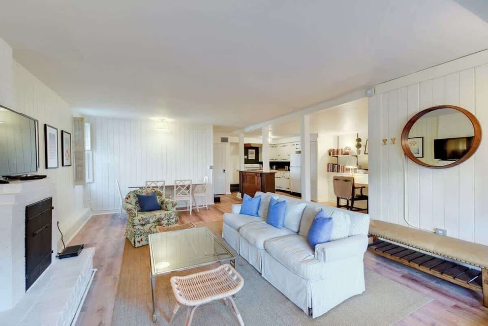 Bright and spacious living area with comfortable seating and an open layout for relaxing or gathering.