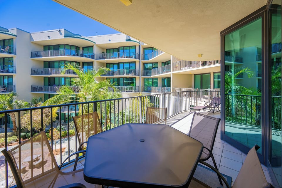 Unwind on the spacious balcony, soaking in the gentle breeze and vibrant coastal views