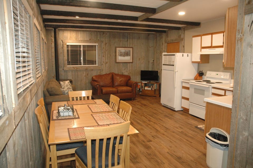 This cozy home has an open kitchen, dining and living room when you enter.