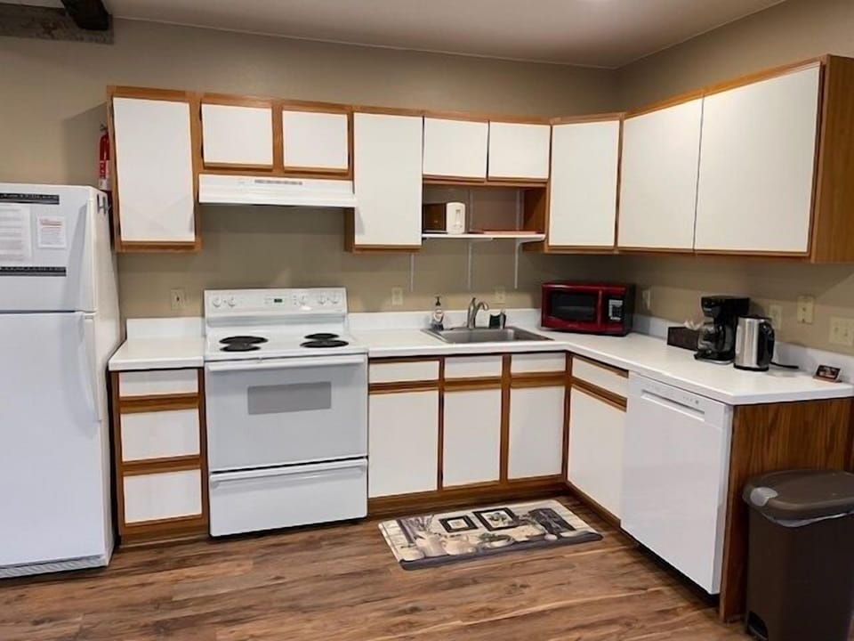 Kitchen area with modern appliances including a newly added dishwasher and all the amenities you need to prepare and enjoy meals.