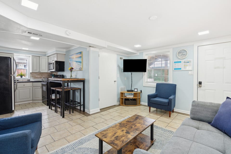 The living space is complete with a sleeper sofa for an additional guest.