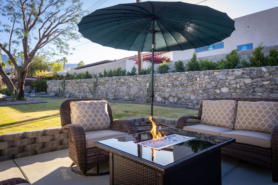 Outside Living area with firepit and umbrella