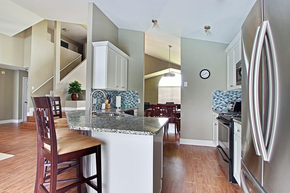 Kitchen with brand new porcelain wood plank flooring
