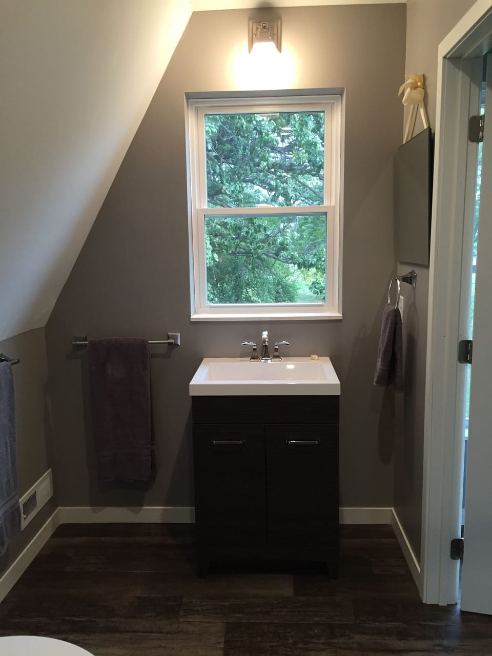 The full bathroom in the yoga / hay loft has a sink, shower and toilet.  