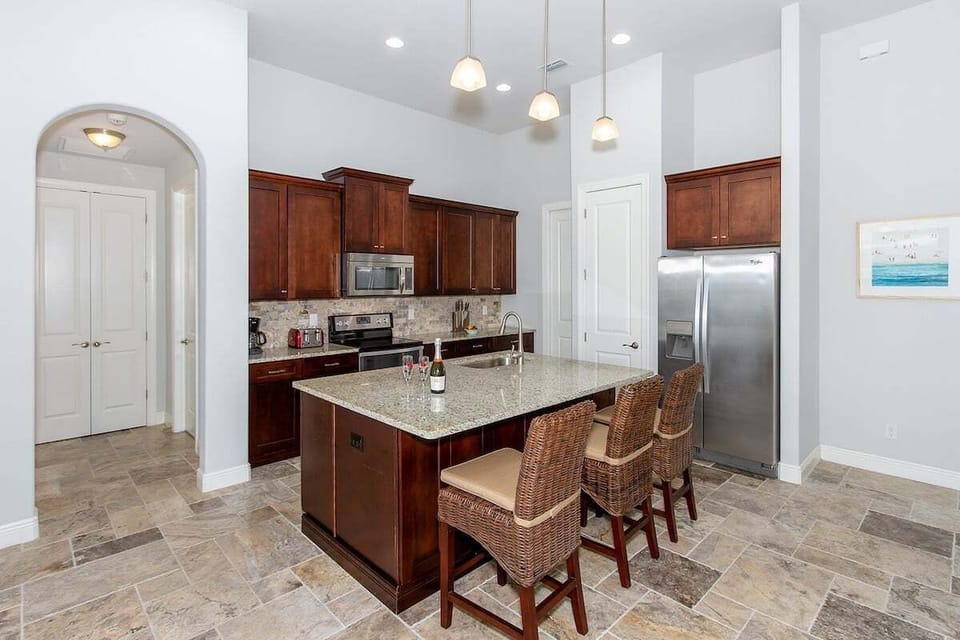 Kitchen with Large Center Island and Stainless Appliances