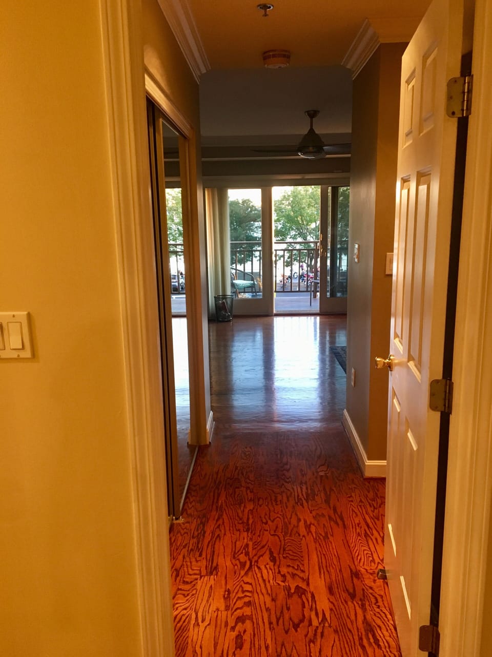 Looking down the hallway from the second bedroom toward the master bedroom