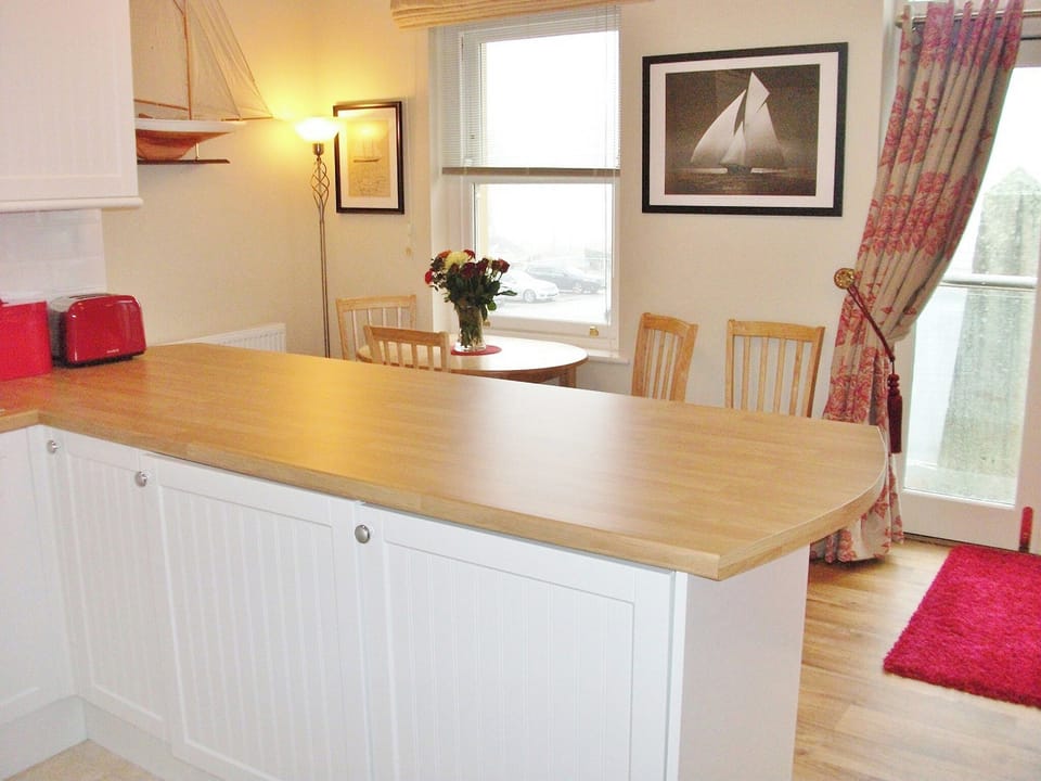 Kitchen with breakfast bar and dining area | Watch House, Fowey