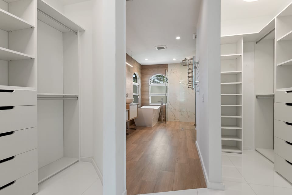 His and Hers Walk in Master Closets