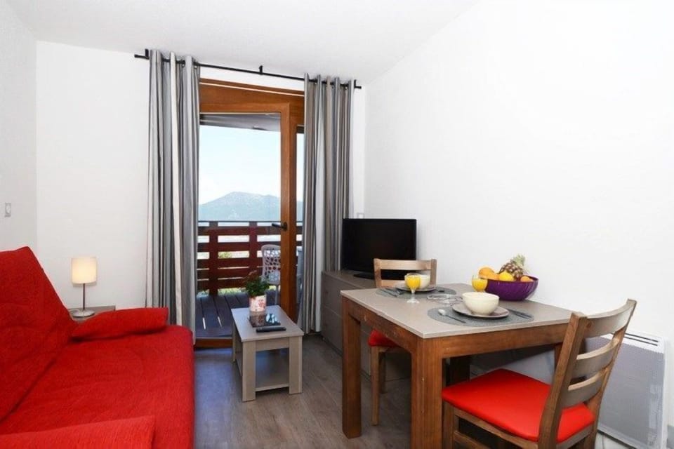 Loads of room at the dining table and the open-concept is always nice for the cook.