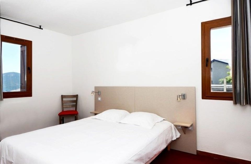 Relax on the comfy Double bed after a day outside.