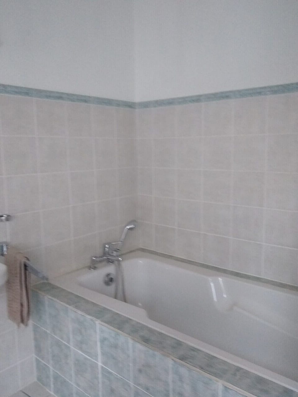 Fourth floor bathroom with shower and bath