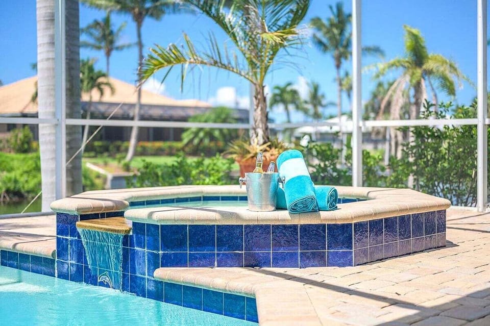 Jacuzzi with Spill Over to Pool