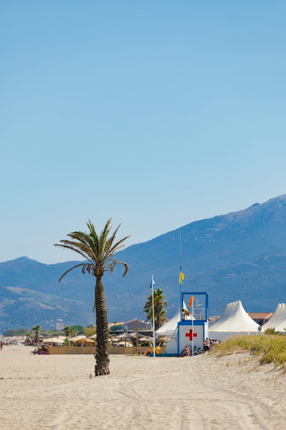 Beach path with lifeguard station and mountain views