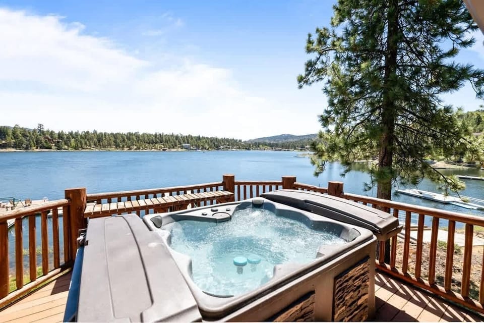 Relax under the stars while gazing at the beautiful lake in the hot tub
