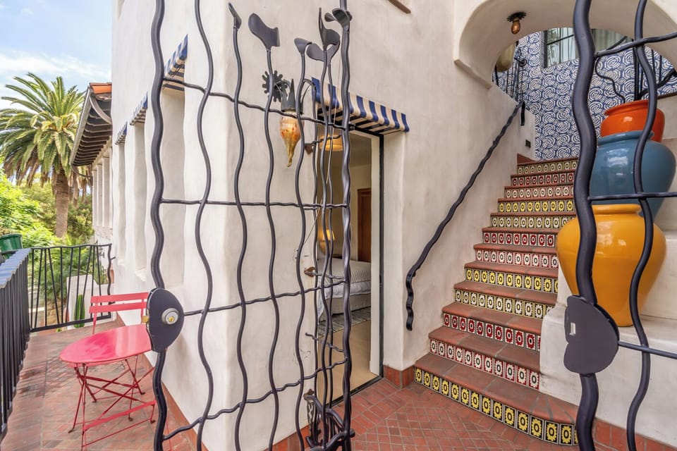 Gated entrance leads to front door