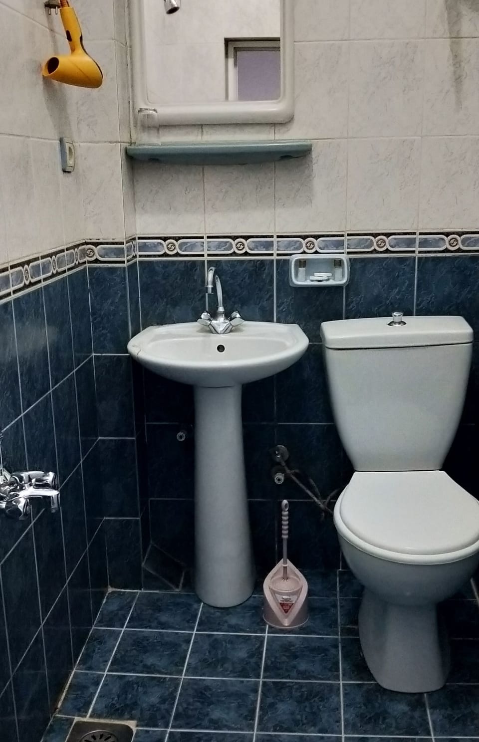 Shower, free toiletries, hair dryer, slippers