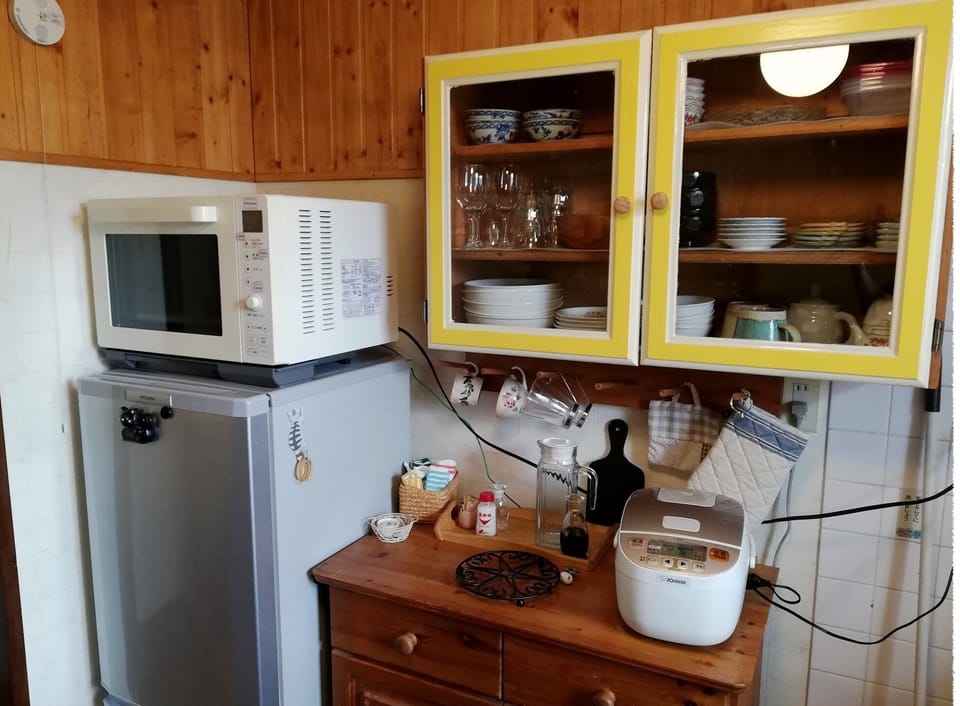 Cupboard, microwave oven, refrigerator, electric kettle, etc.