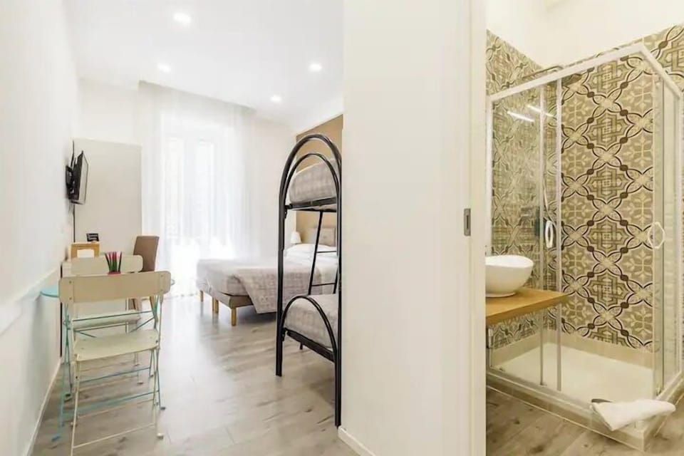 Family Room (Narciso) | Premium bedding, down comforters, memory foam beds, in-room safe