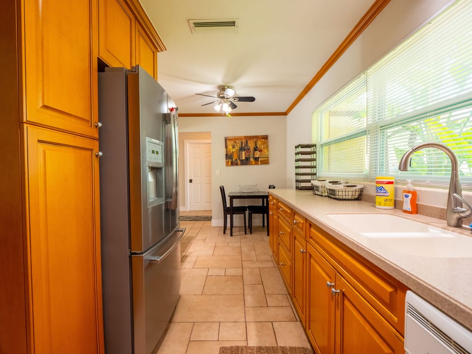 Kitchen with dishwasher, fridge, stove, oven, microwave