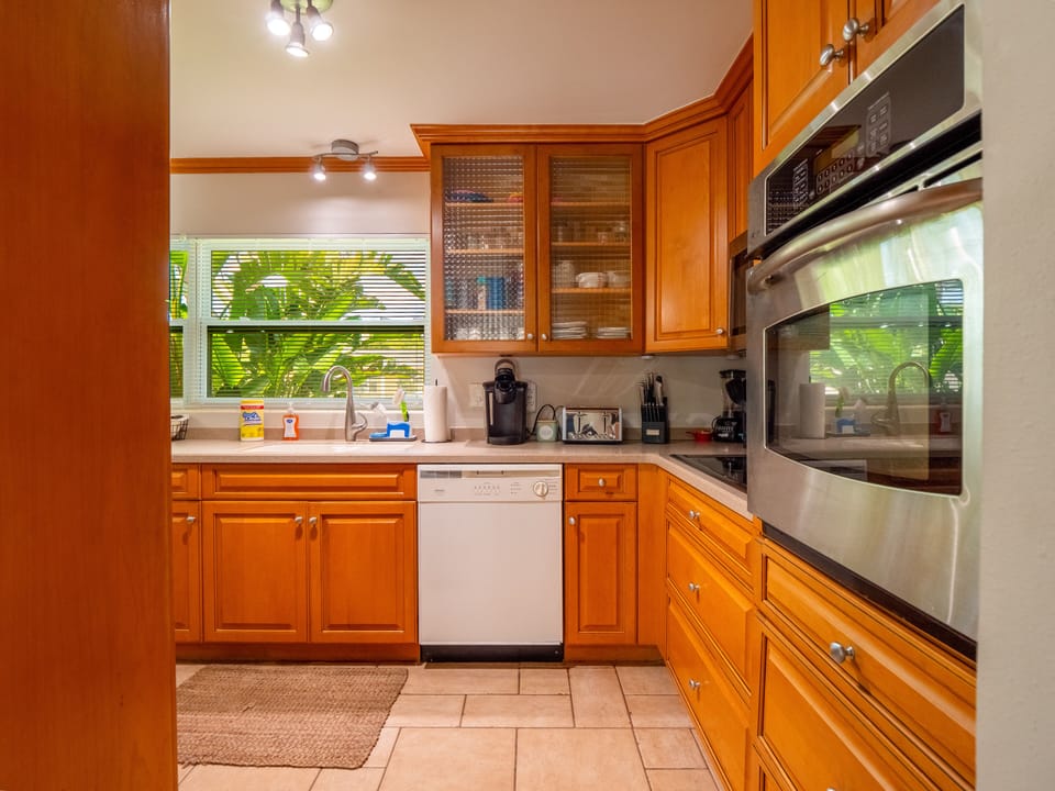 Kitchen with dishwasher, fridge, stove, oven, microwave