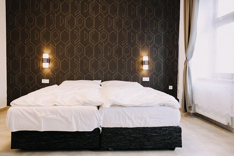 Deluxe Double or Twin Room | Minibar, in-room safe, desk, laptop workspace