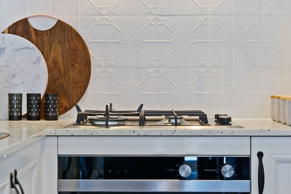 Executive House | Private kitchen | Coffee/tea maker, full-size fridge, microwave, oven