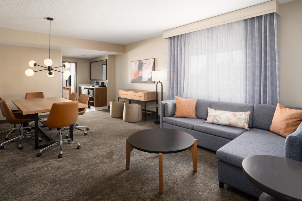 Hospitality Suite, 1 King Bed | Living area | 32-inch flat-screen TV with cable channels, TV, pay movies