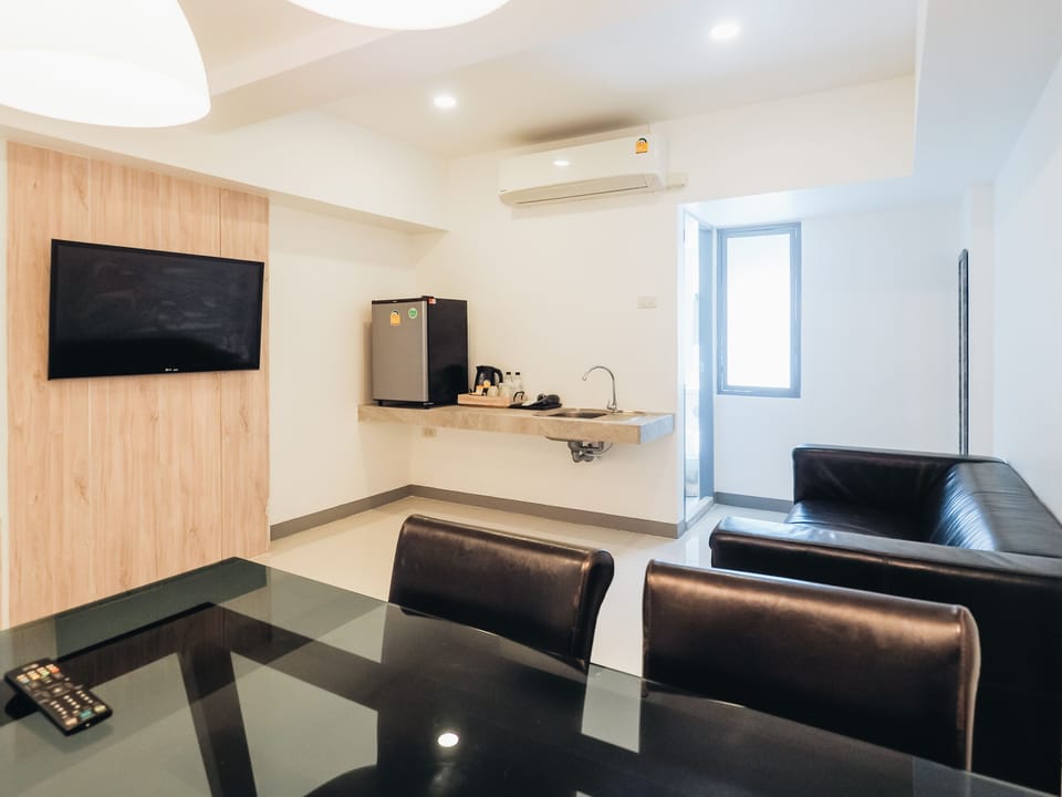 Exclusive Triple Room | Blackout drapes, iron/ironing board, free WiFi, bed sheets