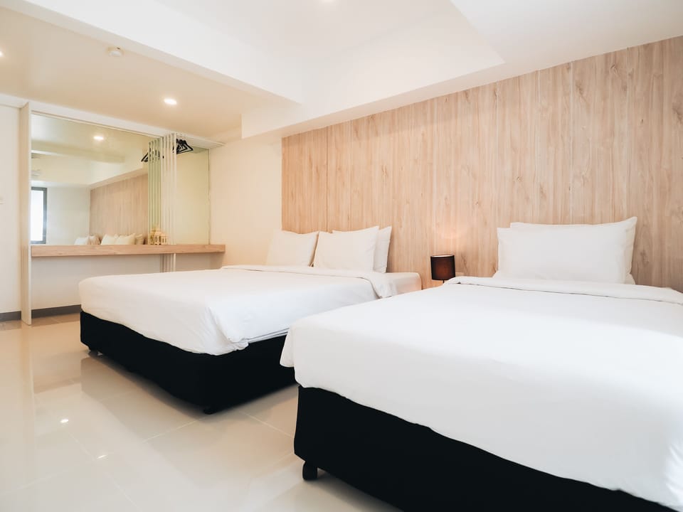 Exclusive Triple Room | Blackout drapes, iron/ironing board, free WiFi, bed sheets