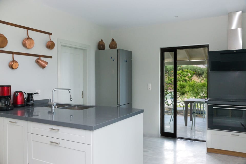 The spacious and practical kitchen is fully equipped to serve all your cooking needs