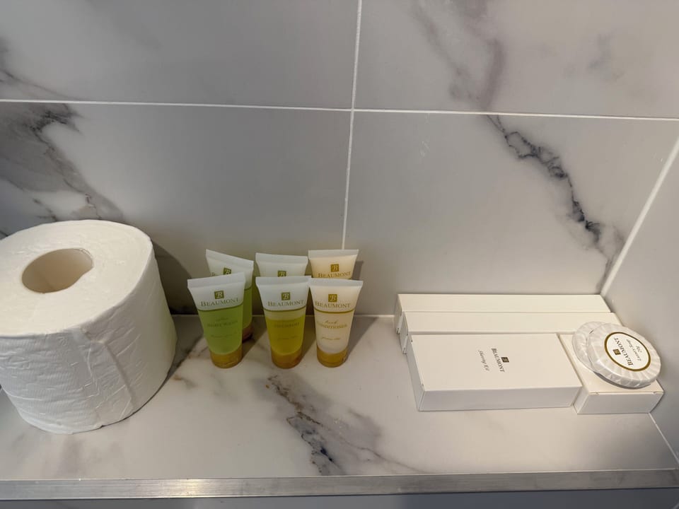 Deluxe Queen + 2 Singles Room | Bathroom | Shower, hair dryer, slippers, towels