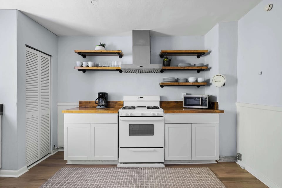 Kitchen with needed cooking supplies 