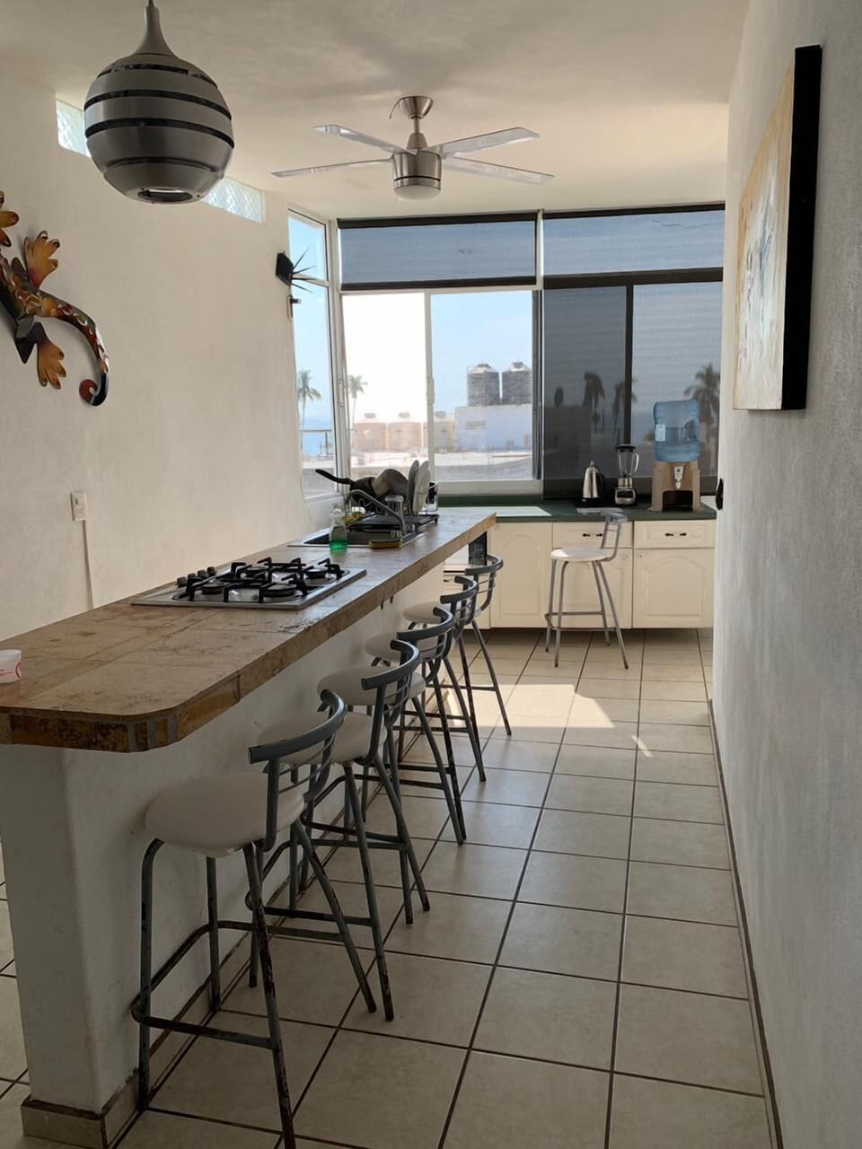Apartment | Private kitchenette | Stovetop, blender, cookware/dishes/utensils